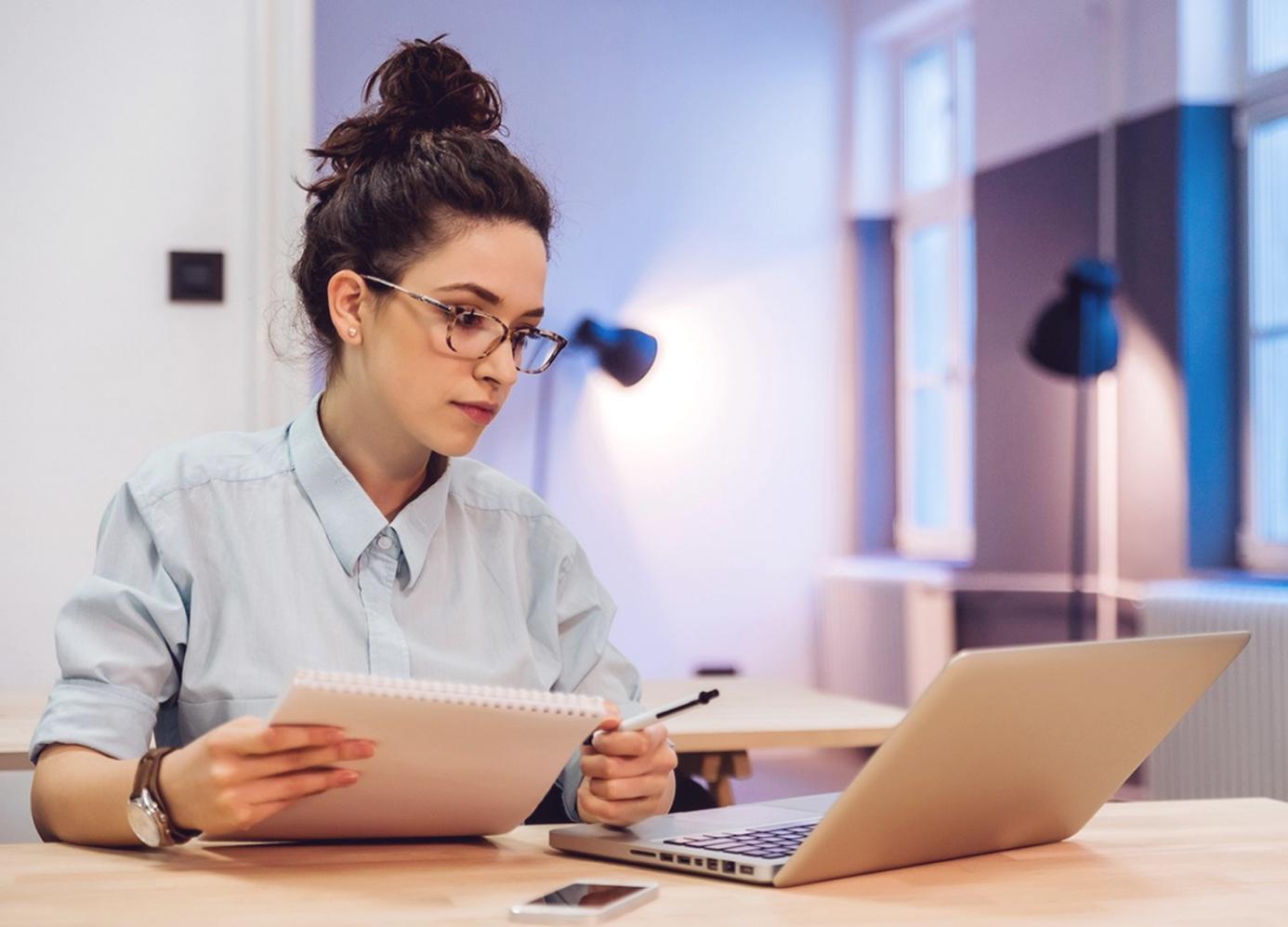 Investment analysis workspace with market data and research materials